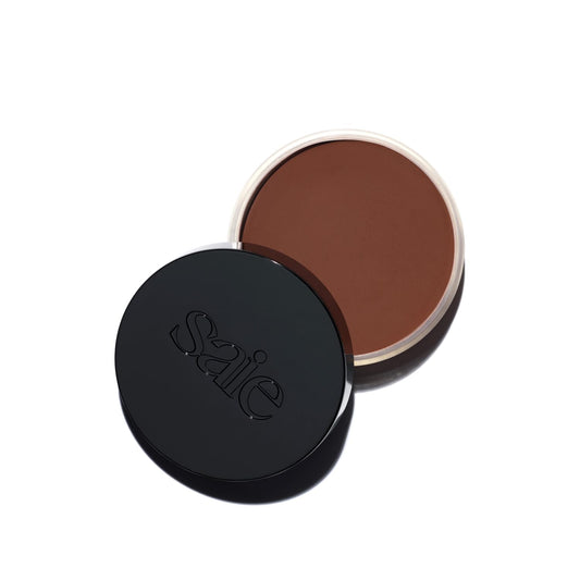 Saie Sun Melt Cream Bronzer - Buildable Balm Face Bronzer for Effortless Sculpting - Cream Contour Enriched with Vitamin C, Nourishing Skincare Ingredients & a Natural Finish - Deep Bronze (1 oz)